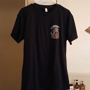 "The Same Ones Who Sell The Panic Sell The Cure"Black Graphic T-Shirt. Sz.L‎